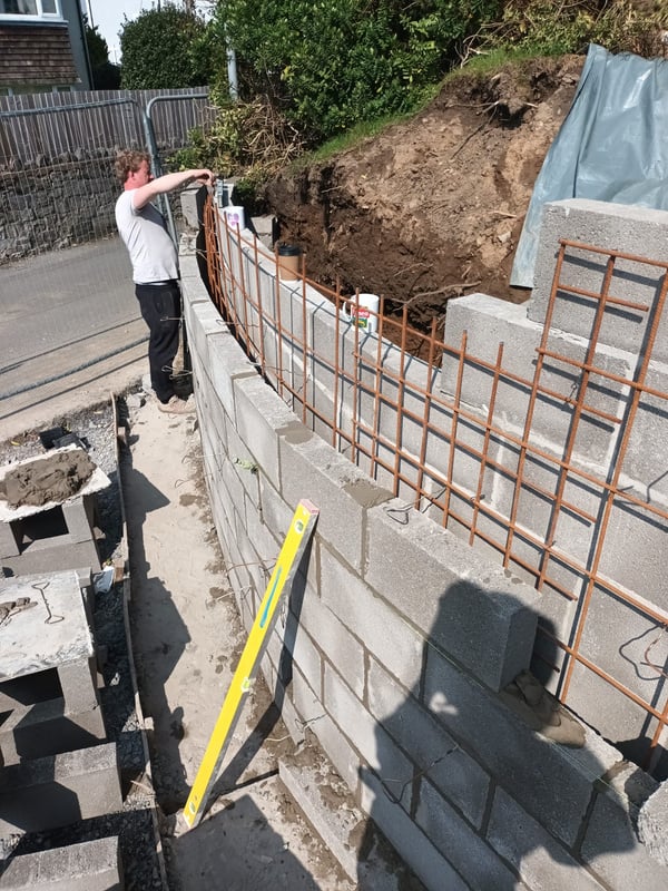 a retaining wall being built