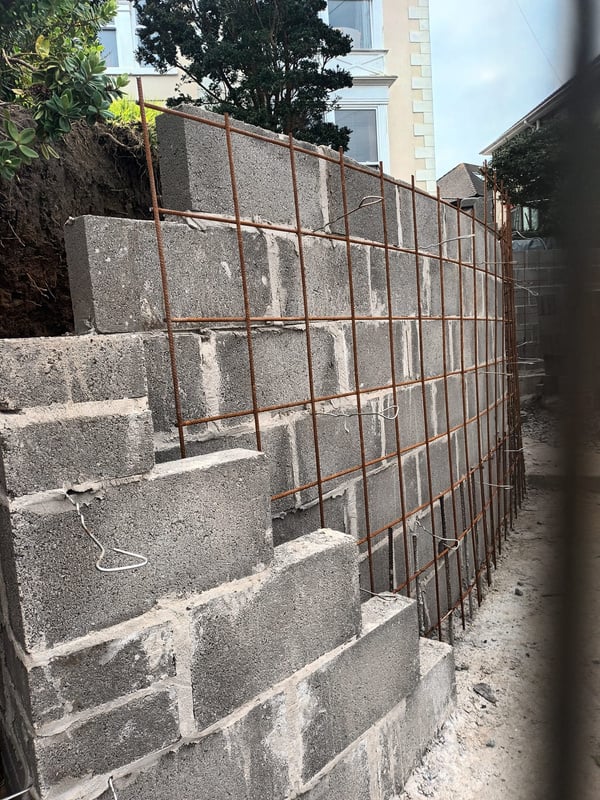 a retaining wall being built