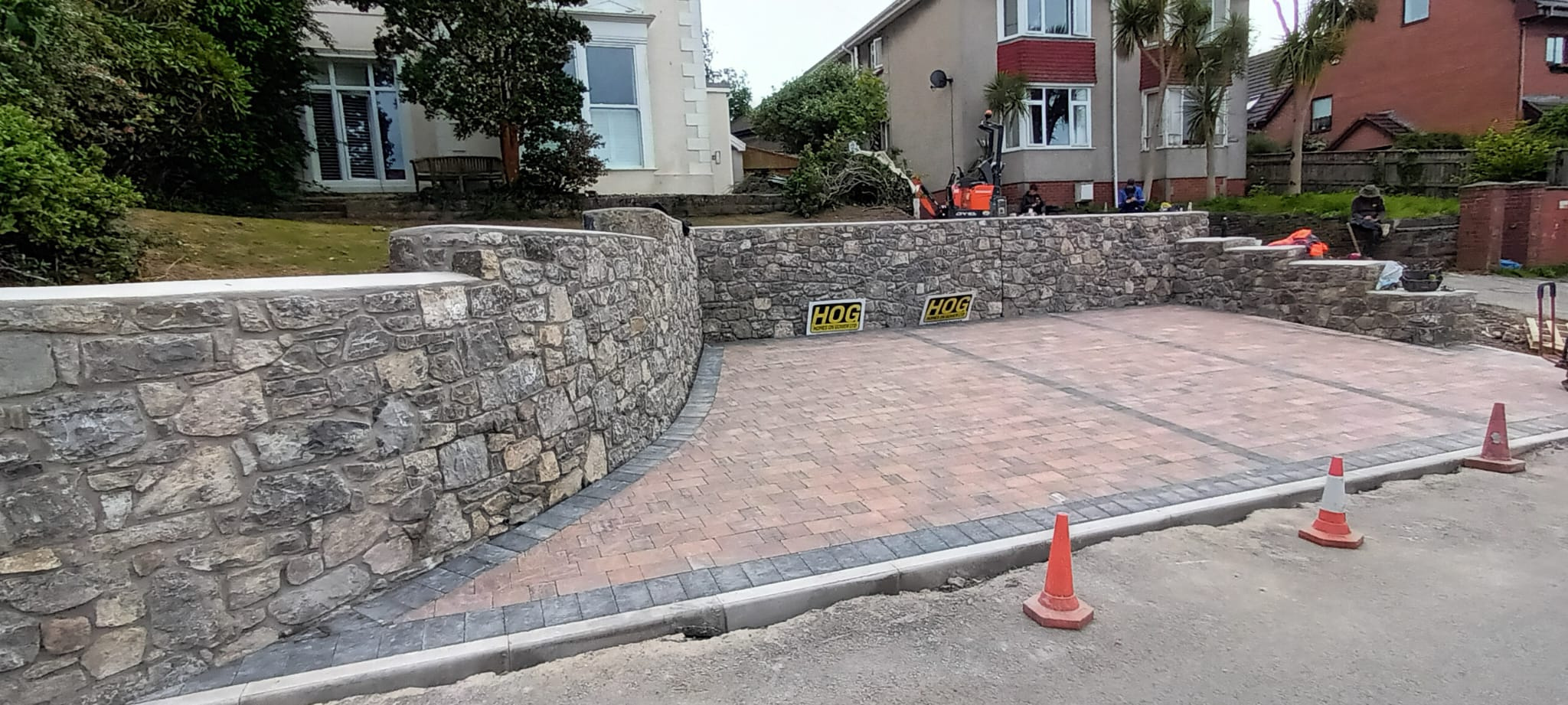 a driveway with retaining walls