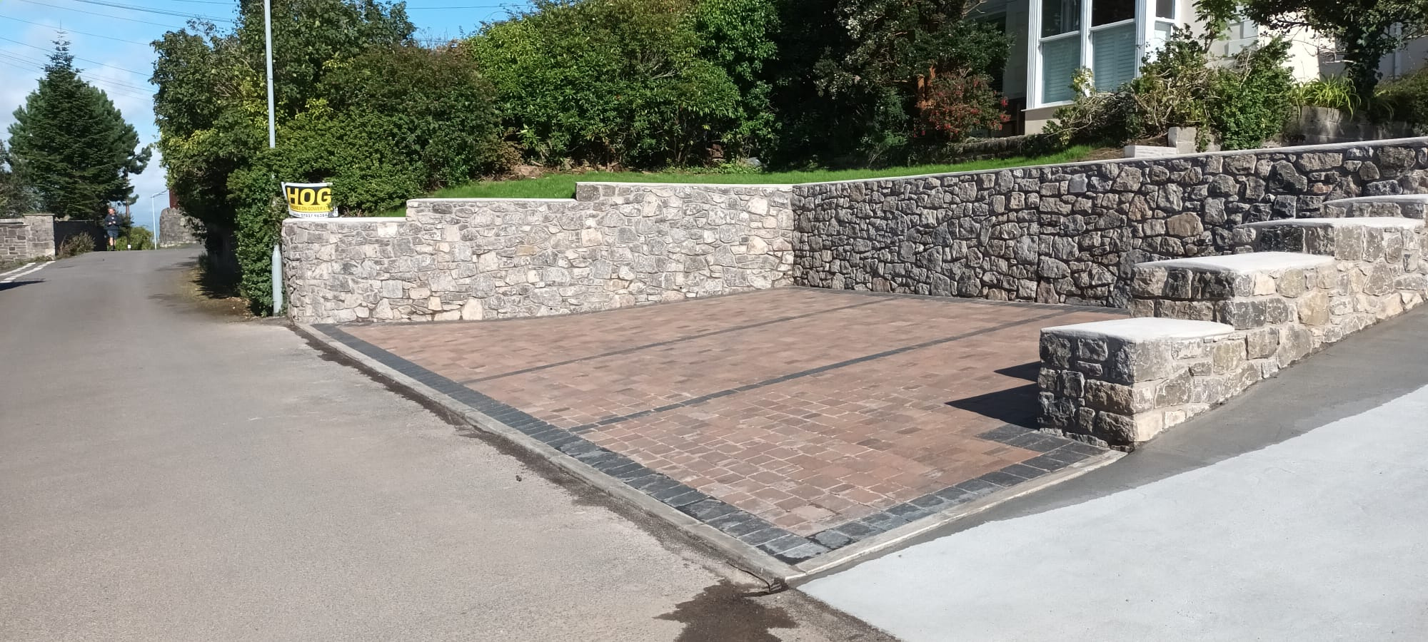 a driveway with retaining walls